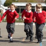 School children running